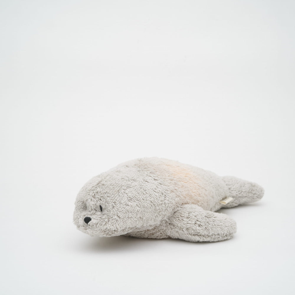 Moonie Knuffel - The Humming Seal Organic 2.0 - Grey Natur | Witte Ruis Zeehond Met Lichtje